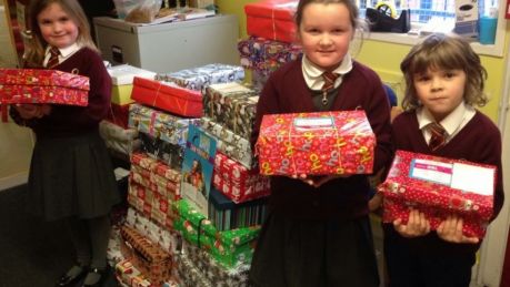 These R3 pupils spent the morning helping Road of Hope pack all 70 shoe boxes from our school :-)
